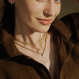 Gold Bezel Organic Pebble Necklace
