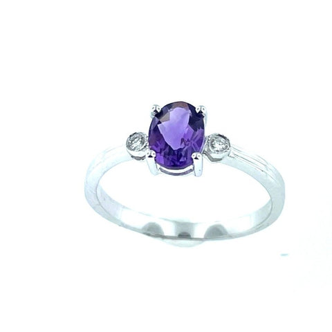 .68 Carats Checkerboard Oval Amethyst with .03 Diamonds on sides. Ring set in 14 karat white Gold. Ring Size 7.00