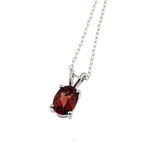.93 Checkerboard cut Oval Garnet Pendant set in 14 karat white gold and hanging on 18" 14K white gold cable pendant chain