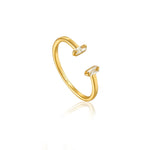Embrace the contemporary baguette design trend. Featuring cubic zirconia stones, this delicate adjustable gold ring is the perfect stacking piece to mix and match. The classic baguette jewelry just got a modern makeover with the Glow Getter collection. These statement pieces will let you shine in the spotlight and become timeless favorites.   • Material: 14kt gold plated on sterling silver • Band style: adjustable • Size: US 5.5 to US 8.5 • Internal diameter: 16mm to 18.5mm • Band width: 2mm • Weight: 1.0g
