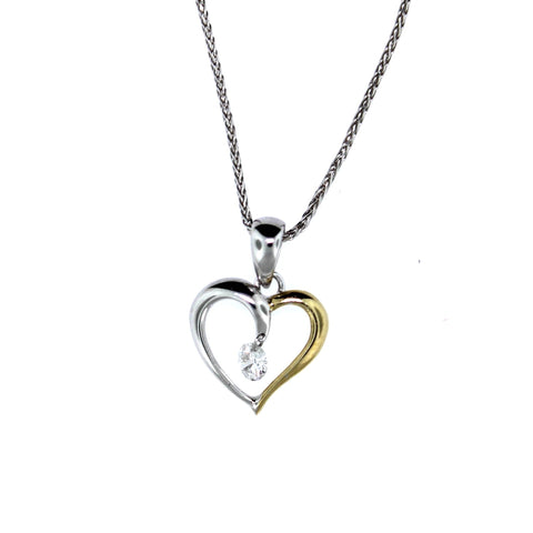 .10 carat Dangle Diamond Heart pendant set in 14 karat two-tone gold. Pendant is on 14 karat white gold 18 inch chain.