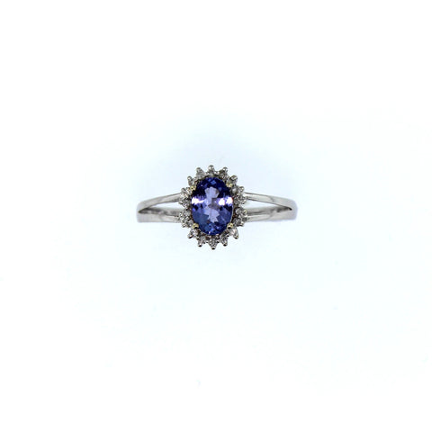.70 Carats Diamond and Tanzanite Ring - Diamonds are Grade SI1-H - Ring is set in 14 karat White Gold - Ring Size is Seven