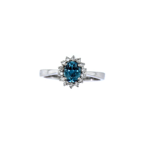 .45 carat Oval Blue Zircon and .15 carat in Diamonds Ring set in 14 karat white gold. Ring size is 7.00.
