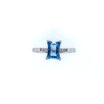 1.55 carat Created Blue Zircon and .02 carat in Diamonds Ring set in 14 karat white gold.  Ring size is 7.00.