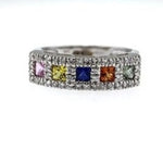 .85 carat Princess cut mutli-color Sapphire with .28 carat Diamond Accent set in 14 karat White Gold. Ring size 7.00