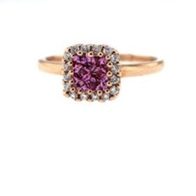 4 Round Illusion Set Pink Sapphires with Diamond Halo set in 14 karat Rose Gold. Ring size 7.00. Approximately .50 carat Total weight