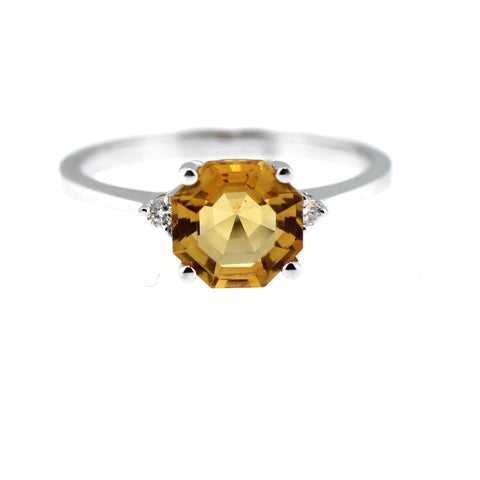 1.29 carat Round Citrine and .03 carat in Diamonds SI1 -I Ring set in 14 karat White Gold. Ring size is 7.00.