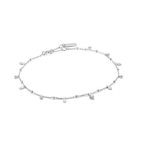 Exude effortless bohemian style with this minimal silver anklet. Featuring delicate cubic zirconia stones, this anklet is the piece your summer outfits have been missing. This anklet is in the Bohemia collection.  • Material: rhodium plated on sterling silver • Anklet length: 230mm with 25mm extender • Weight: 1.9g