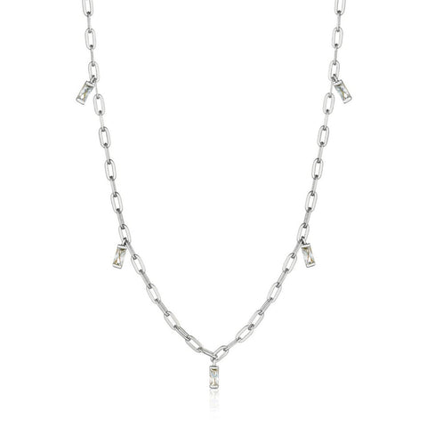 Mix up your look with this statement, large cable chain silver necklace. Featuring cubic zirconia baguette drops, it is designed to make you stand out in style. The classic baguette jewelry just got a modern makeover with the Glow Getter collection. These statement pieces will let you shine in the spotlight and become timeless favorites.   • Material: rhodium plated on sterling silver • Necklace length: 14 inches with 2 inch extender • Weight: 3.6g