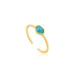 Brighten up your day with a little help from this gold ring featuring a beautiful turquoise stone. Its adjustable sizing means it’s the perfect fit for everyone. Give your wardrobe an update with this piece of the Mineral Glow collection.   • Material: 14kt gold plated on sterling silver • Band style: adjustable • Size: US 5.5 to US 8.5 • Stone size: 4mm x 6mm • Weight: 0.8g